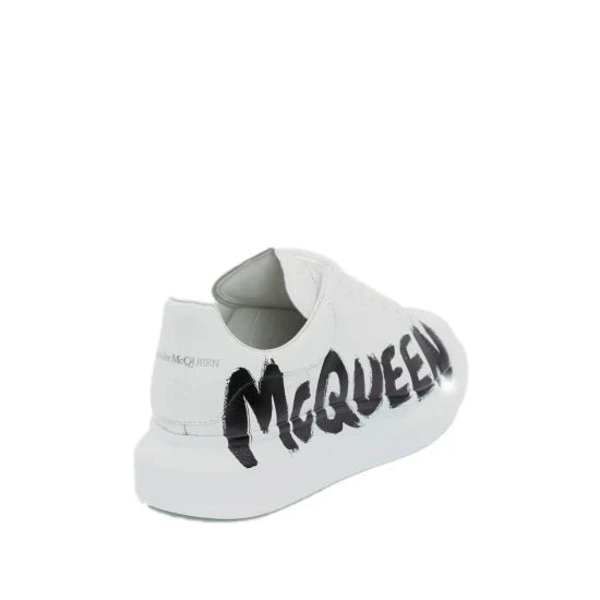 Alexander McQueen Oversized graffiti low-top sneakers