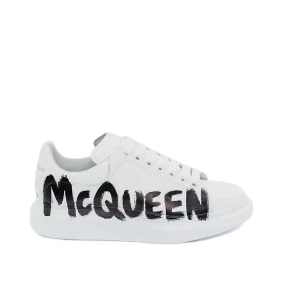 Alexander McQueen Oversized graffiti low-top sneakers