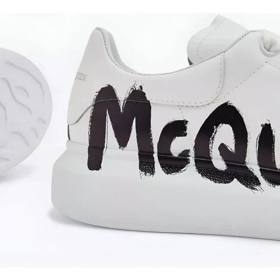 Alexander McQueen Oversized graffiti low-top sneakers